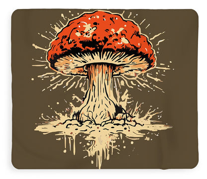 Mushroom blanket featuring red mushroom cap with splatter lines and beige stem on dark brown