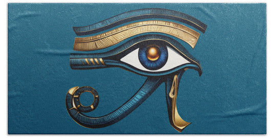 Blue beach towel with stylized Eye of Horus ancient Egyptian eye symbol print