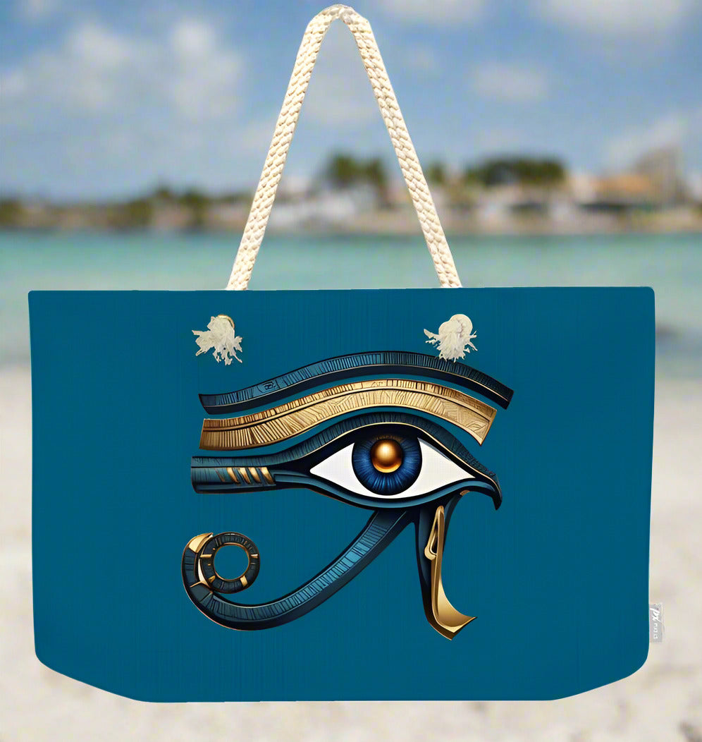 Teal weekender tote bag with Eye of Horus emblem and white rope handles