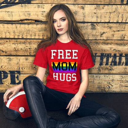 Red T-shirt with “FREE MOM HUGS” text and a rainbow stripe graphic on the front.