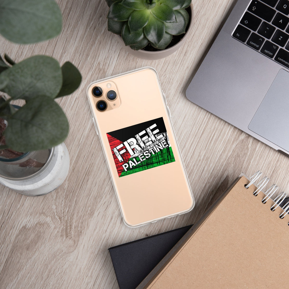 Clear iPhone case, light beige, 'FREE PALESTINE' graphic, camera lens openings