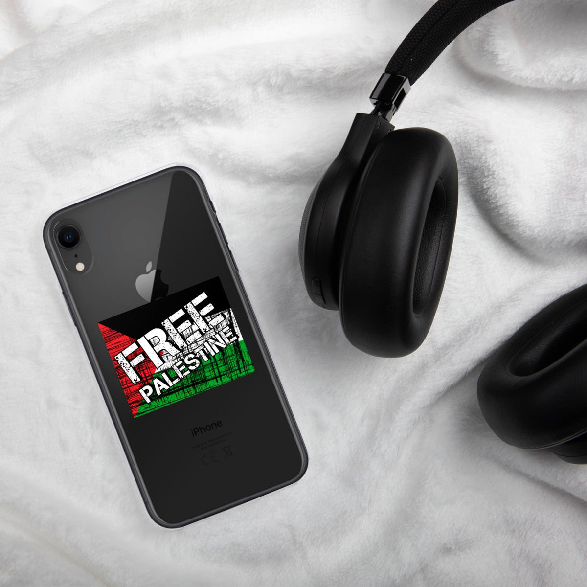 Clear iPhone case displaying “FREE PALESTINE” graphic on dark phone back