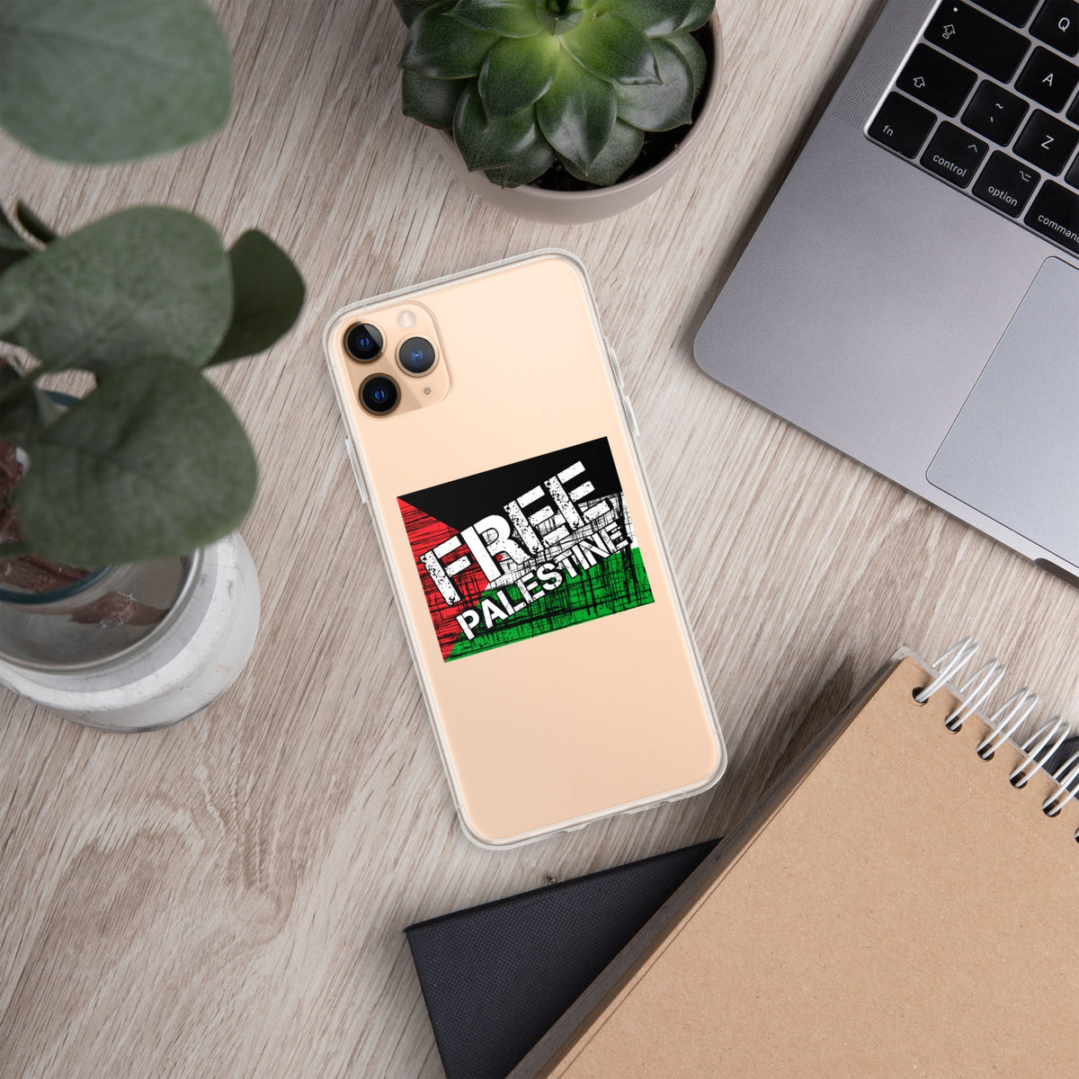 Clear iPhone case, light beige, 'FREE PALESTINE' graphic, camera openings