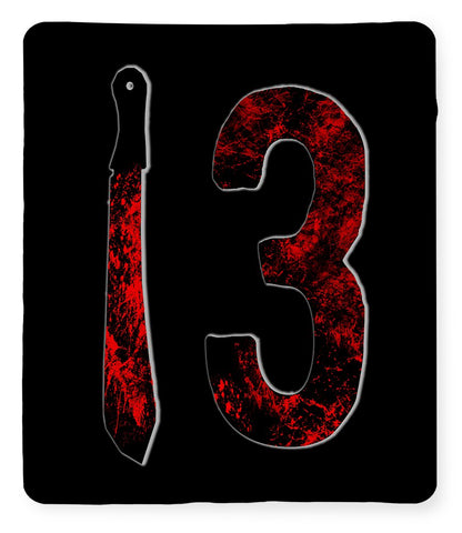 Black fleece blanket with distressed red “3” graphic and vertical dagger icon