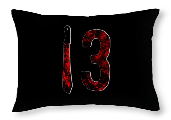 Throw pillow with black cover and red "13" graphic