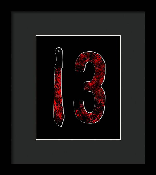 Framed print with red number 3 and knife on black, dark frame and white mat