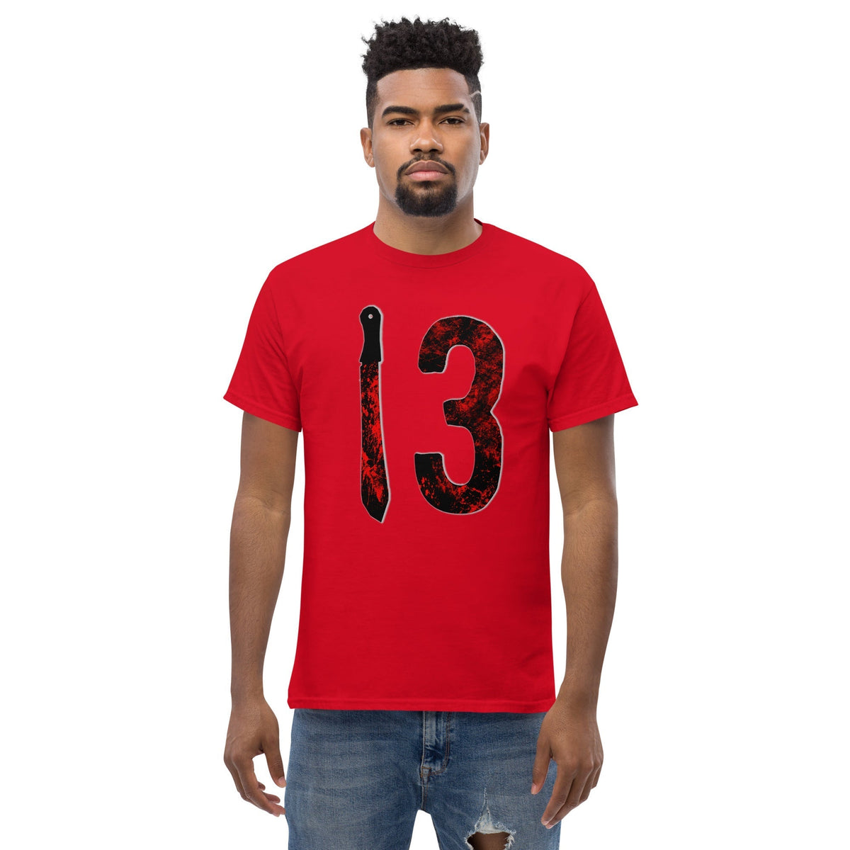 Red T-shirt with large distressed “3” graphic and vertical knife design in black and red