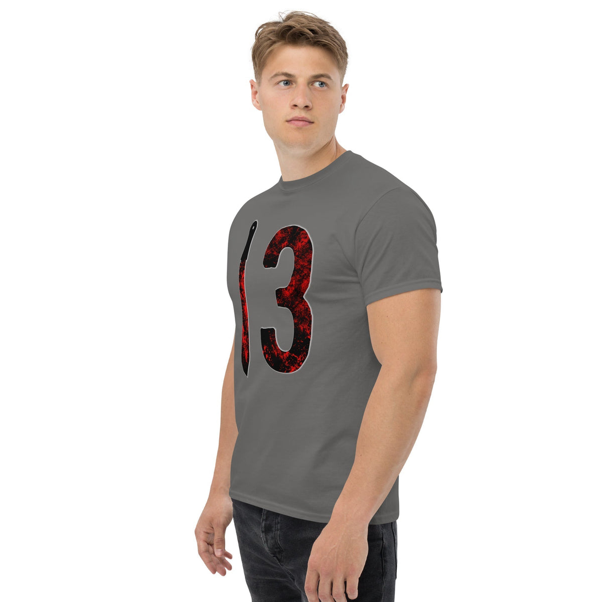 Charcoal gray T-shirt on model, side view, with distressed “3” and vertical knife graphic