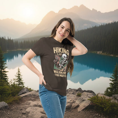 Dark brown hiking T-shirt on model with skull-and-forest front graphic and text