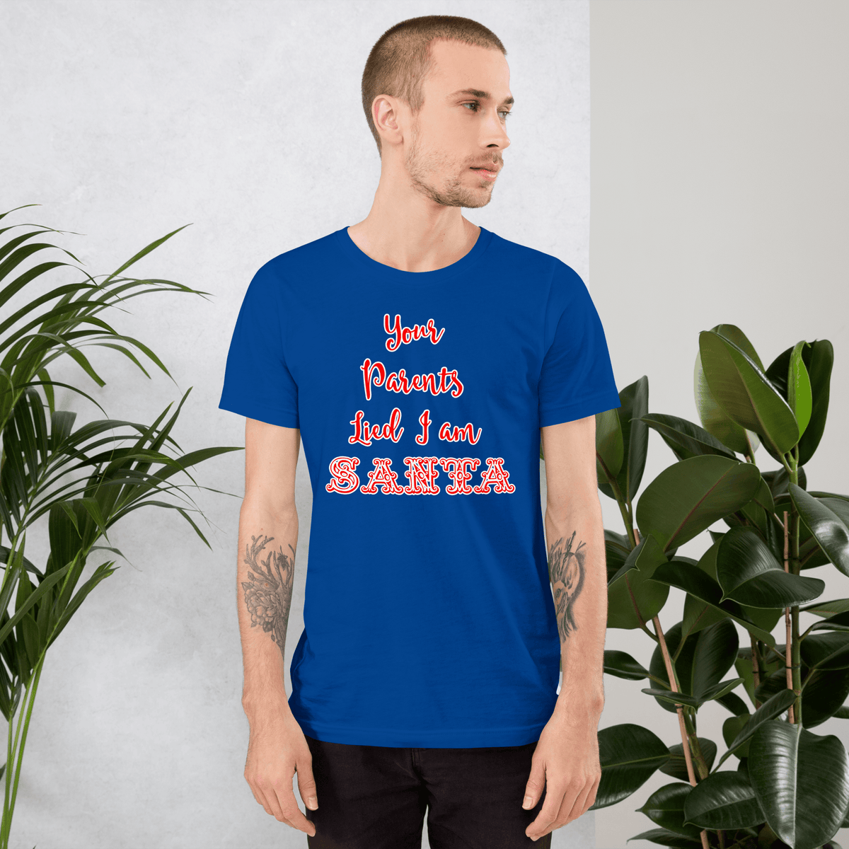 Blue Santa-themed T-shirt with red and white 'Santa' text graphic in side view
