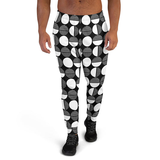 Men’s joggers with black-and-white circular geometric pattern and cuffed ankle legs