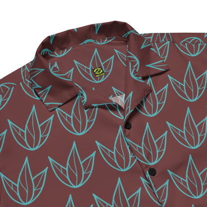 Close-up of unisex dark maroon short-sleeve button shirt with teal leaf print.