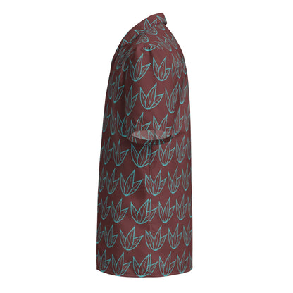 Unisex button-up shirt, angled side view, maroon and teal leaf pattern, short sleeves
