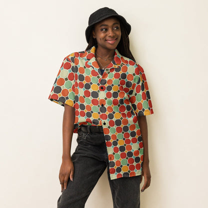 Multicolor patterned short-sleeve button shirt with collar, worn with dark pants