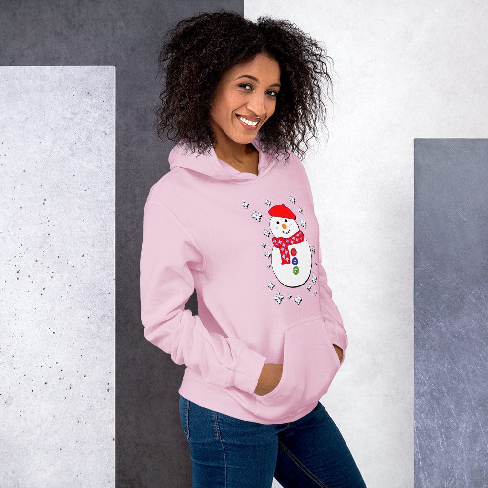 Light pink snowman hoodie with snowflake wreath graphic on the chest