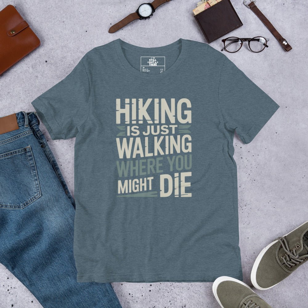 Slate blue hiking T-shirt with white "HIKING IS JUST WALKING WHERE YOU MIGHT DIE" print