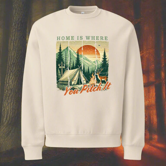White oversized sweatshirt with camping graphic and “You Pitch It” text