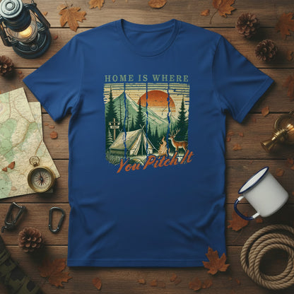 Royal blue camping T-shirt with tent and pine trees graphic and “Home is where” text