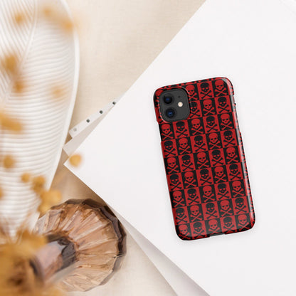 Red phone case with black skull pattern and rounded protective corners