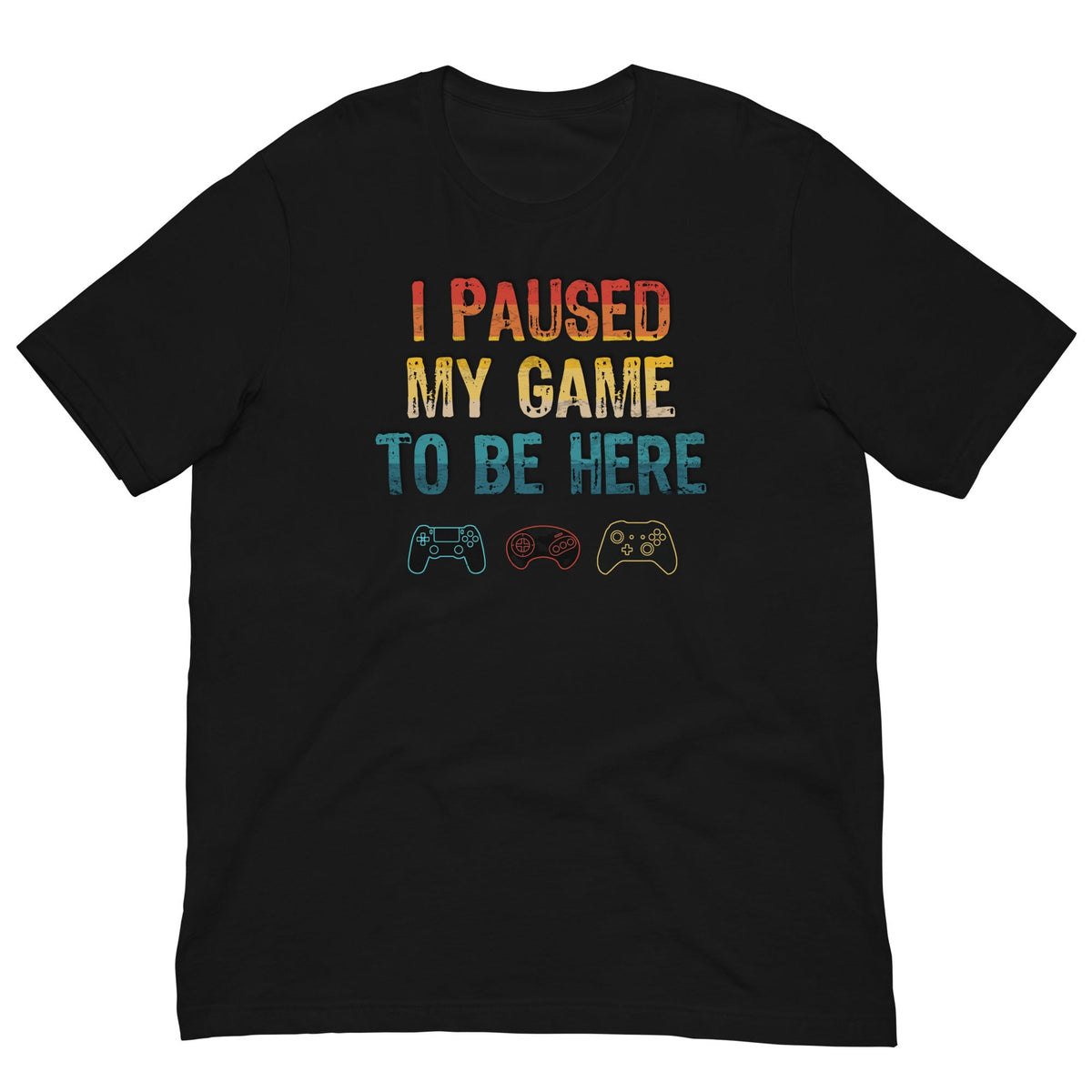 Black graphic T-shirt: "I PAUSED MY GAME TO BE HERE" with controller icons