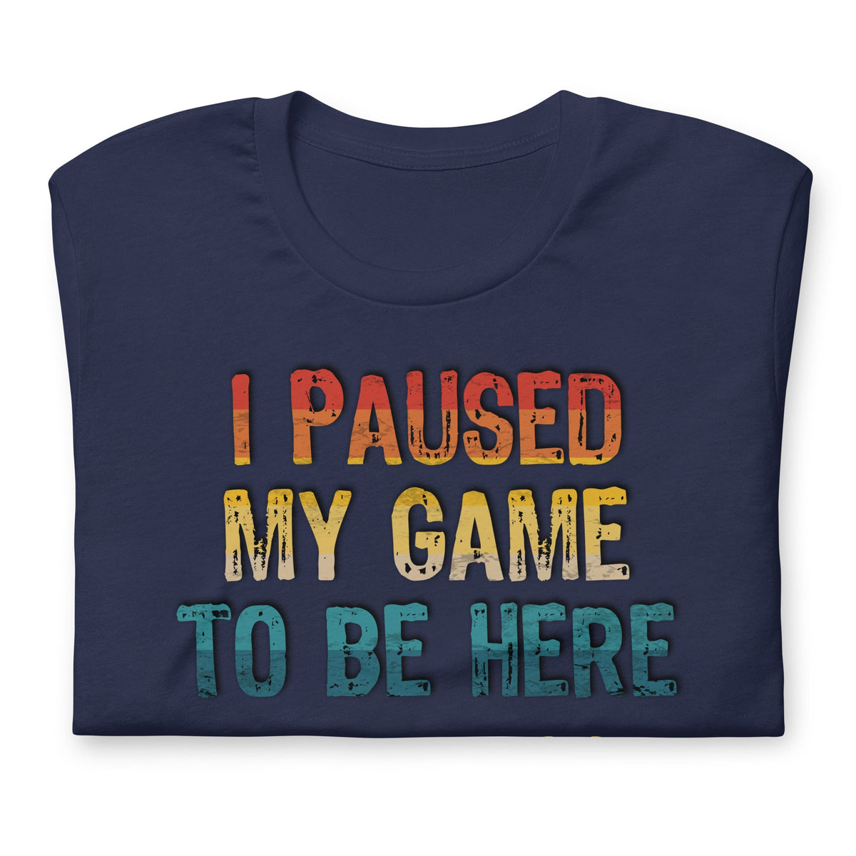 Navy graphic T-shirt: "I PAUSED MY GAME TO BE HERE" with controller icons