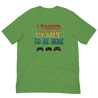 Green T-shirt with “I paused my game to be here” gaming controller graphic on front