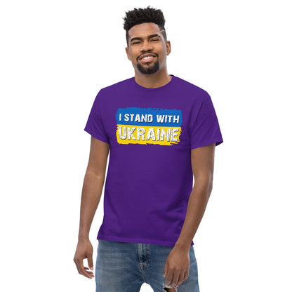 Purple crewneck T-shirt with “I STAND WITH UKRAINE” graphic in blue and yellow