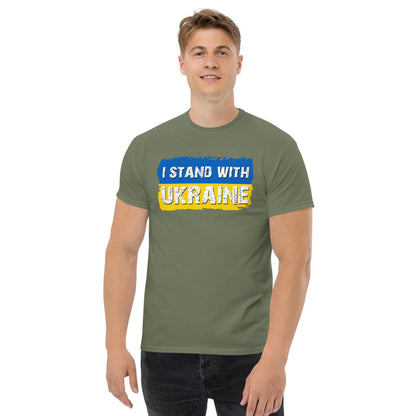Olive green crewneck T-shirt with “I STAND WITH UKRAINE” graphic in blue and yellow