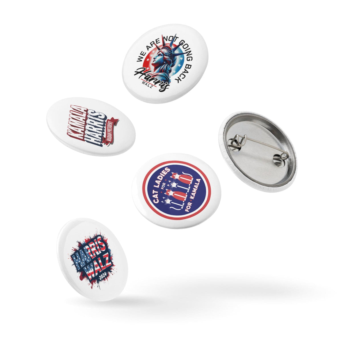 Loose set of five round pin buttons with front designs and metal backing visible