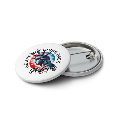 Round campaign pin button shown open, front graphic with visible metal back