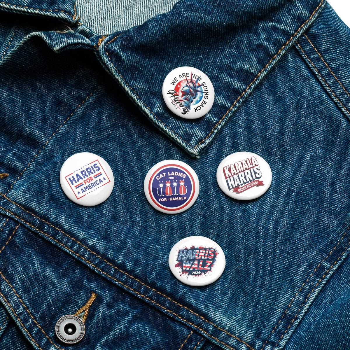 Set of 5 round Kamala Harris political button pins on denim, showing Harris for America and Cat Ladies