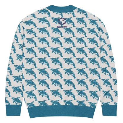 Knitted cardigan with blue whale print and ribbed hem in solid blue