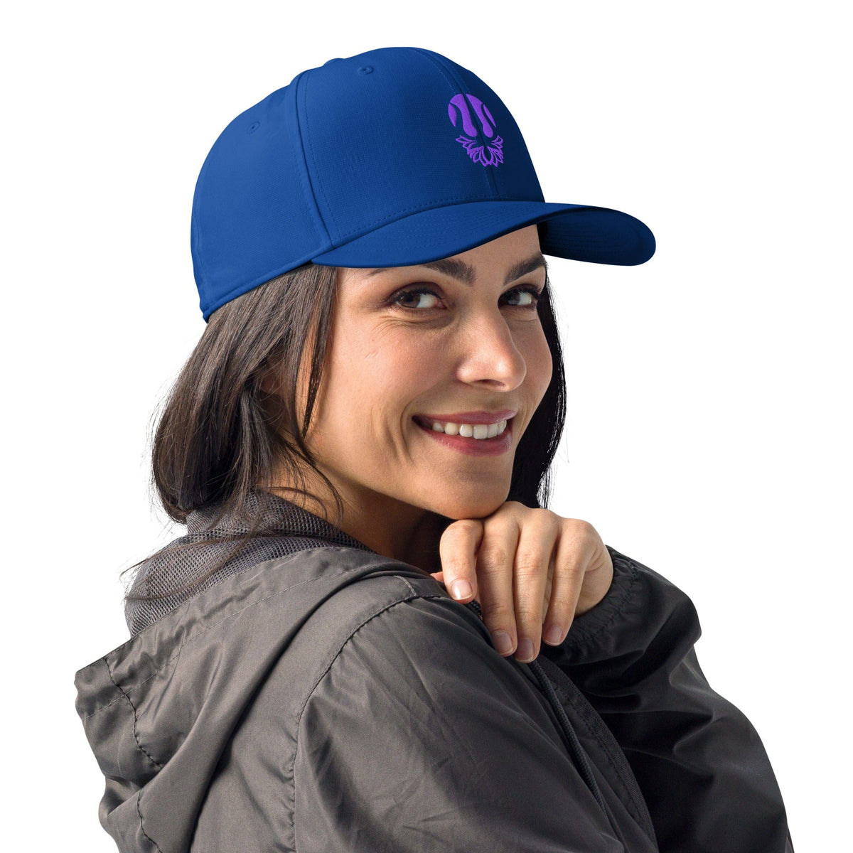 Blue performance cap with purple lotus trident emblem, worn on head by person.