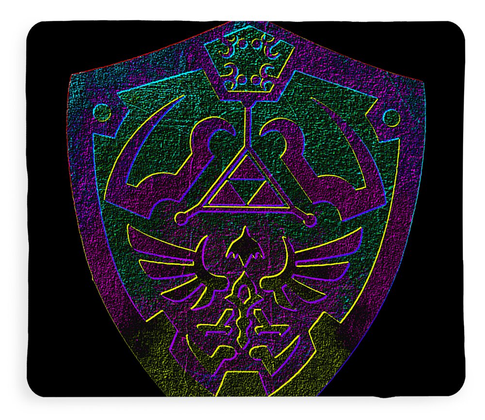Dark plush blanket with purple and green shield emblem graphic, close view.