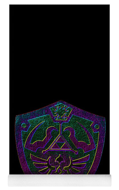 Yoga mat with dark surface, purple-green shield emblem, and white trim