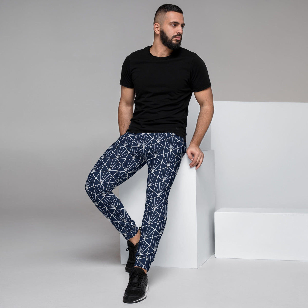 Men's joggers in navy with white geometric print, slim tapered silhouette
