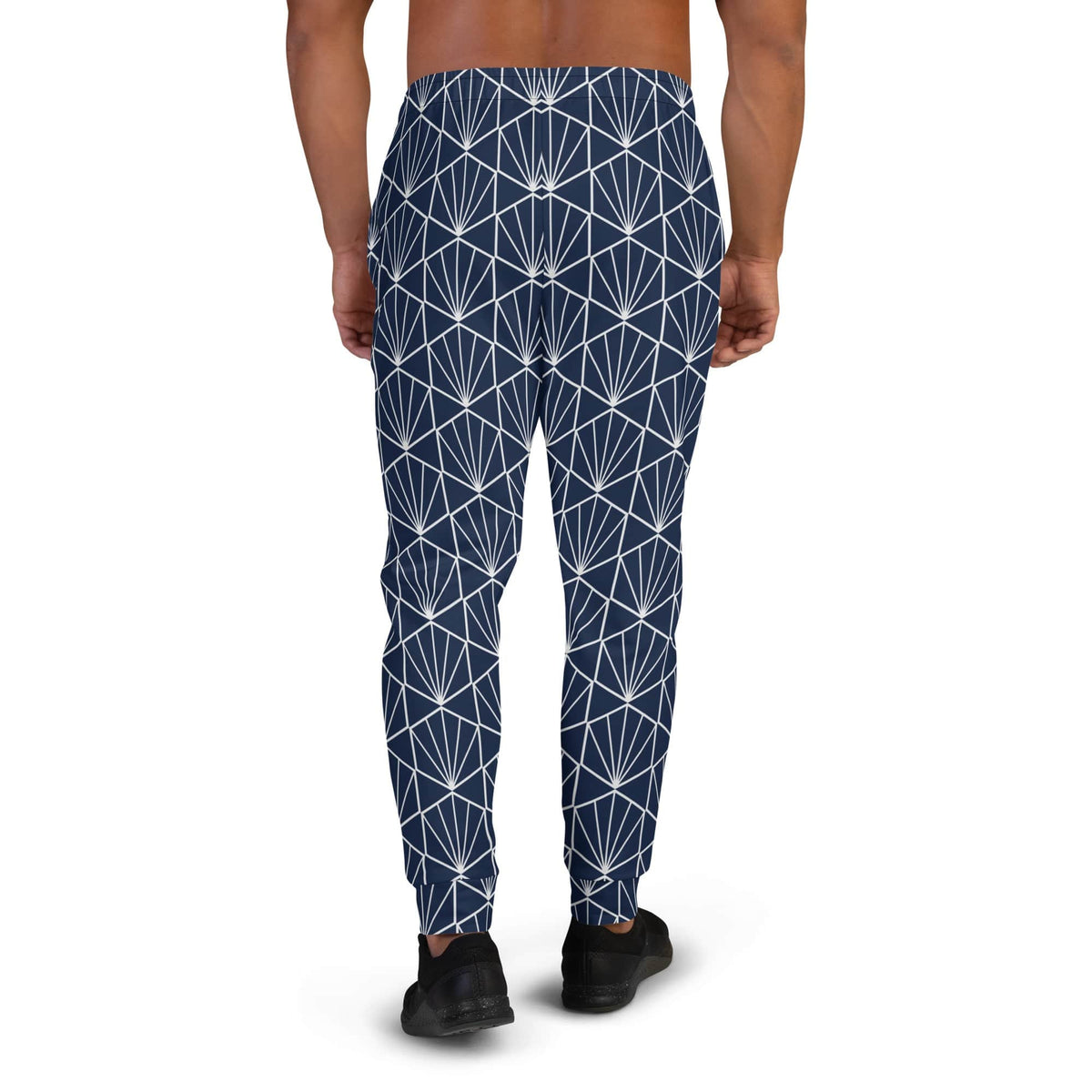 Men's joggers with navy base and white geometric pattern, tapered legs