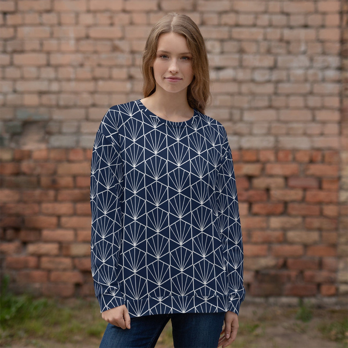 Navy crewneck sweatshirt with white geometric pattern, long sleeves on model