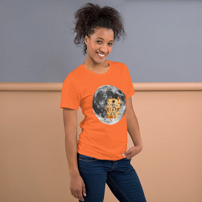 Orange T-shirt with circular astronaut on the moon graphic