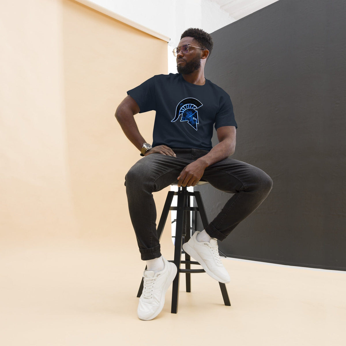 Navy T-shirt with blue Ancient Greek helmet graphic on the chest.
