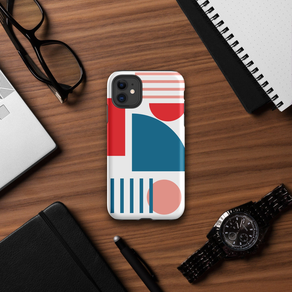 Tough iPhone case with abstract red, blue, and coral design and raised camera protection