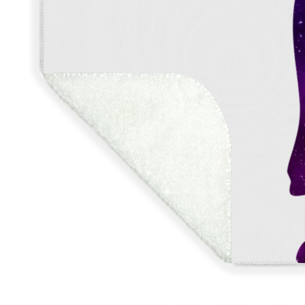 White fleece blanket corner with stitched edge and partial dark purple galaxy rabbit