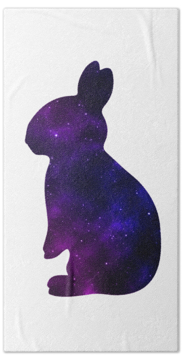Beach towel featuring a dark purple galaxy-style rabbit silhouette on white
