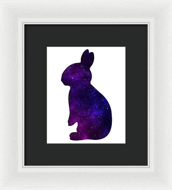 Framed print of purple galaxy rabbit silhouette with dark frame and white mat