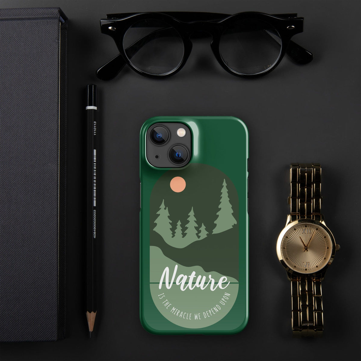 Green iPhone snap case with nature trees and moon graphic, camera cutouts.