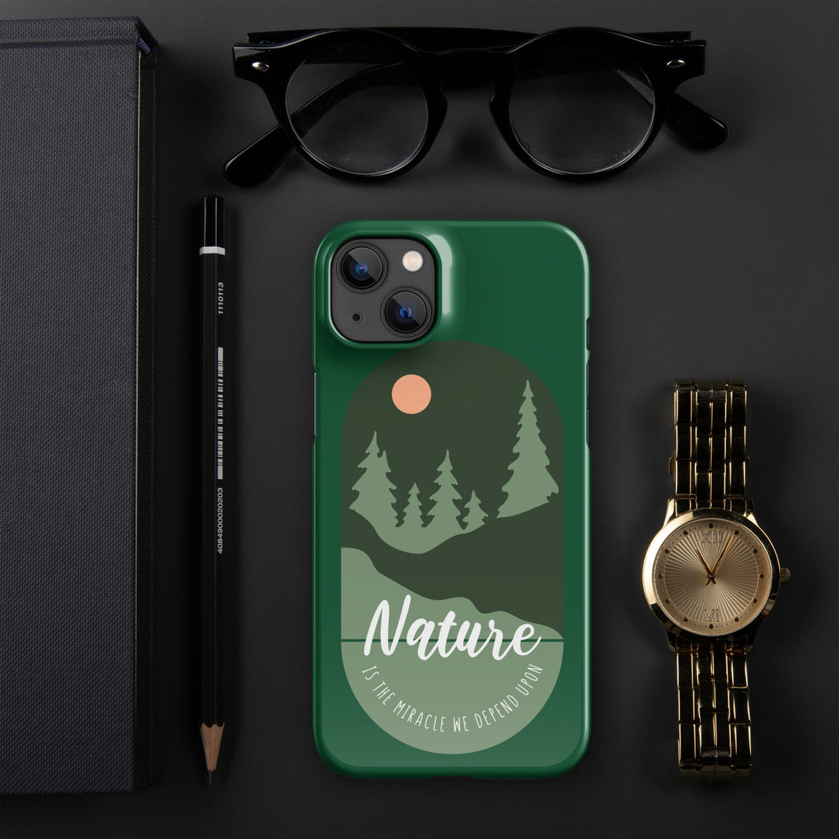 Green iPhone snap case with nature forest scene and moon dot, camera cutout.