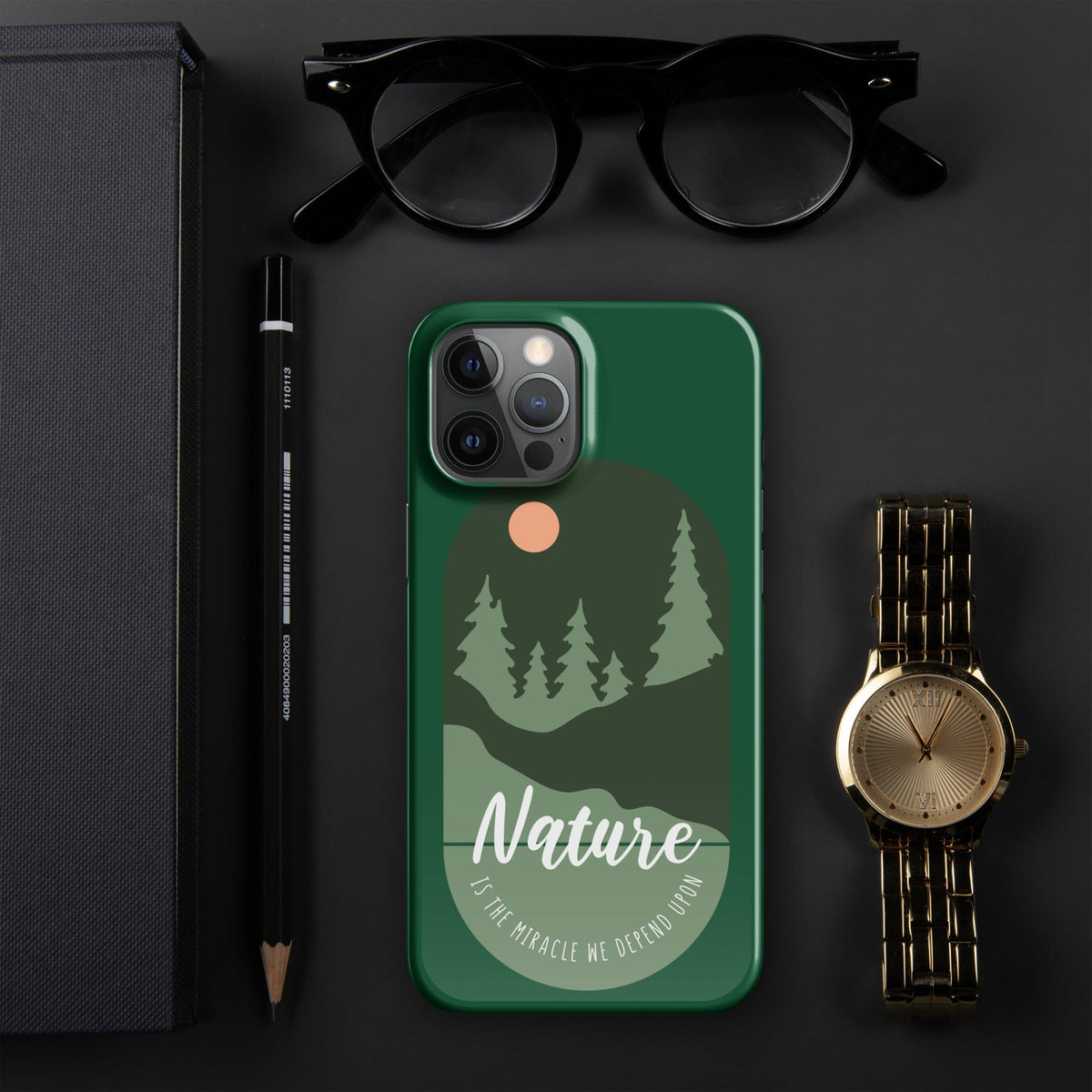 Green iPhone snap case with nature landscape artwork, tree silhouettes, and camera module cutouts