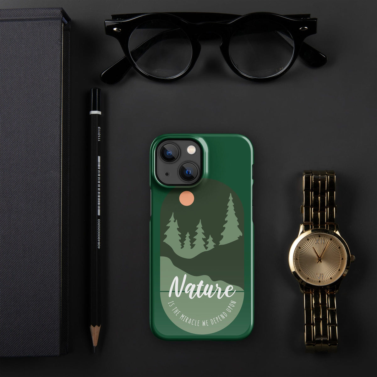 Green iPhone snap case with nature graphic, forest trees, and camera cutouts on back