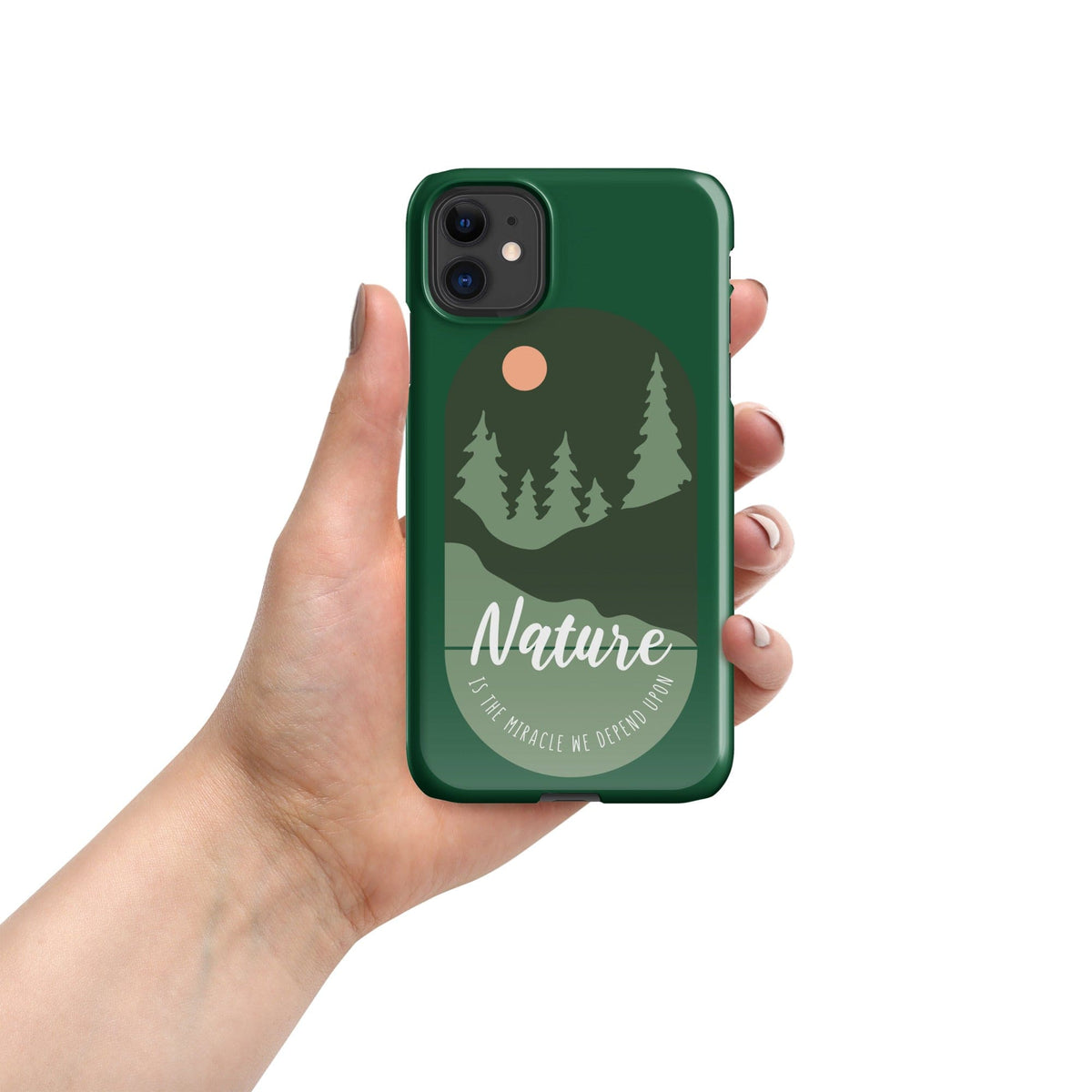 Green iPhone snap case held in hand, Nature forest design with camera cutouts
