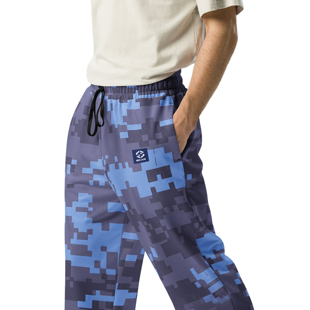 Digital camouflage joggers with elastic waistband, drawstring, and front logo detail